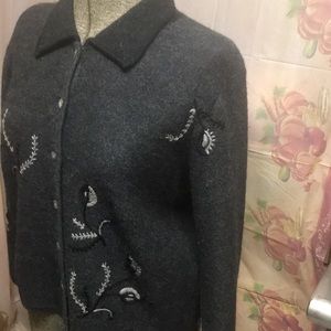 Ladies 100% wool sweater, new condition.